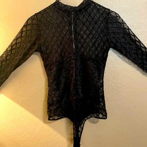 Long sleeve button crotch bodysuit.  Perfect for any occasion